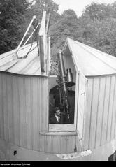 Felicjan Kępiński with Cook refractor telescope at University of Warsaw Astronomical Observatory 1925