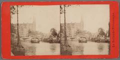 Street view of Singel 446-472 in Amsterdam with the bridge between Koningsplein and Heiligeweg and R.K. Church De Krijtberg at number 446