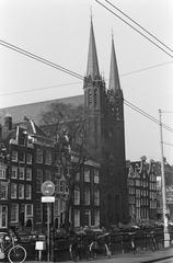 Facade of St. Franciscus Xaveriuskerk or De Krijtberg Church overlooking the Singel canal in Amsterdam