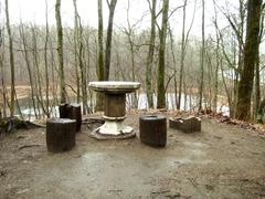 Trakų Vokės Manor Park outdoor card table surrounded by chairs