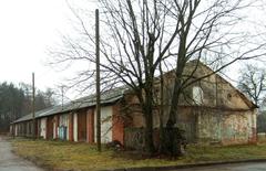Trakų Vokės manor courtyard barn with traditional red brick walls and tiled roof