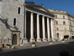 Scenic view of Assisi, Italy with historic architecture and green hills