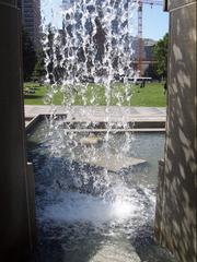 View of Yerba Buena Gardens waterfall memorial to Martin Luther King, Jr. with Mission Street in the background