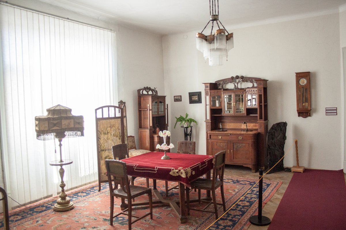 Art Nouveau interior of East Slovak Museum with ornate wooden furniture and decorative wall patterns
