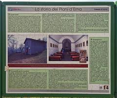Informative board detailing the history of Piani d'Erna mountain area