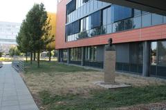 Masaryk University campus buildings with modern architecture and green lawns