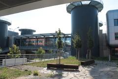 Masaryk University Campus building with trees and clear sky
