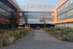 Masaryk University Campus with modern buildings and green lawns under a clear sky