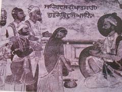 Detail of Mata Jito adding sugar crystals to Amrit during the first Sikh baptism ceremony by Guru Gobind Singh
