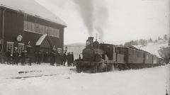 Historic 4-4-0 n2v locomotive NSB 13a No. 73 at Dombås station in 1913 during the Dombaasbanen opening ceremony