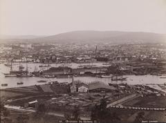 Panoramic view of Christiania from Ekeberg showing boats, harbors, churches, and ships