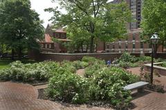 Garden dedicated to signers of the Declaration of Independence with greenery and brick pathways