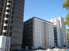 Nagoya University Tsurumai Campus main building with modern architecture and surrounding greenery
