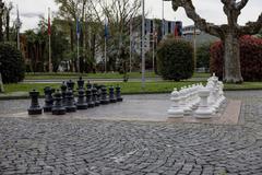 Giant chess boards on the street in Locarno's Piazza Filippo Franzoni with Locarno Walk of Fame in the background