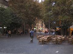 View of Plaza de España in Palma de Mallorca with historical architecture and busy streets