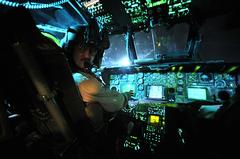 U.S. Air Force pilot from 20th Expeditionary Special Operations Squadron pre-flight check on MH-53 Pave Low helicopter at Joint Base Balad Iraq
