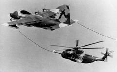 U.S. Air Force Sikorsky HH-53B Super Jolly Green Giant helicopter refueling mid-air from Lockheed HC-130H/P near Stratford Connecticut July 1967