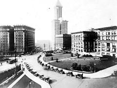 Historic view of Court House Square in Seattle showing King County Courthouse, L.C. Smith Building, and Frye Hotel