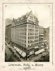 Exterior of Lowman & Hanford Co. building at 107 Cherry Street, Seattle, 1920 with Smith Tower visible behind
