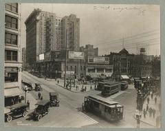Seattle city streets intersection of Second Avenue and Yesler Way circa 1920 with visible vintage storefronts and signage