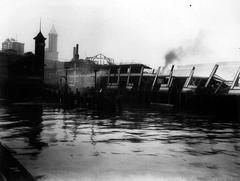 Post-fire remains of Galbraith, Bacon & Co. dock at foot of Madison St. Seattle 1914