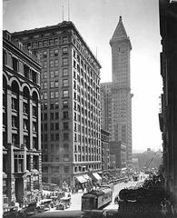 Second Avenue in Seattle looking south toward Cherry Street with street lights, automobiles, and buildings including the LC Smith Building