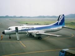 Air Nippon YS-11 airplane at OIM Airport