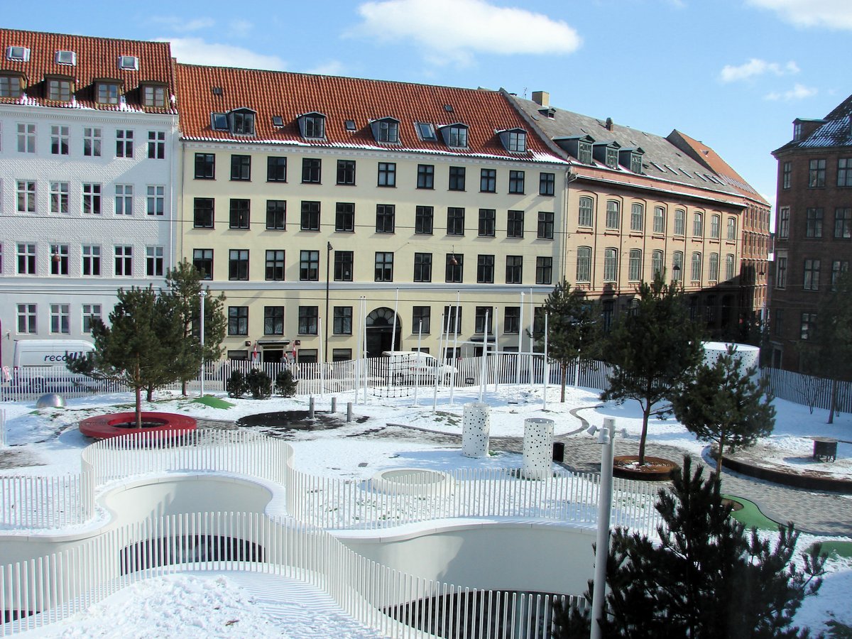 Hauser Plads square in Copenhagen with historic buildings and pedestrian area