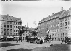 Hauser Plads city square in Copenhagen Denmark with historic buildings and outdoor seating