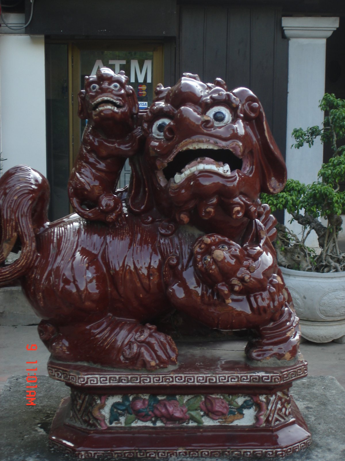 Detail of the 4th courtyard architecture with intricate wood carvings and traditional design