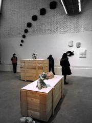 Sculpture exhibition hall in 798 Art Zone with various sculptures on display