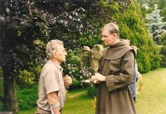 Luboš Hruška and P. Michal Pometel meditating in a serene garden