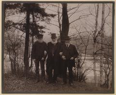 Dr. Bell, McIntyre and Brooks laying the first telephone line at home