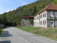 Entranced view of Huť Františka ironworks museum building surrounded by greenery