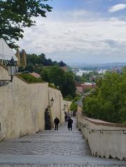Stone staircases leading up to the Prague Castle in Czech Republic on a clear day