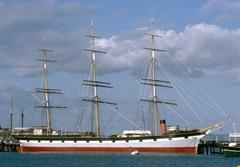 Three-masted square-rigged sailing vessel Balclutha moored at Hyde Street Pier in San Francisco