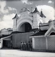 Black and white photo of Nizam's Sarf-i-Khas army soldiers guarding Purdah gate of King Kothi palace Hyderabad