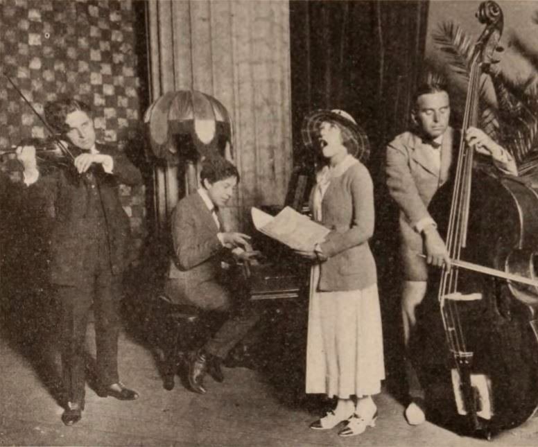 Charlie Chaplin, Sidney Patrick Grauman, Mary Pickford, and Douglas Fairbanks as a band at Grauman's Million Dollar Theater in June 1920