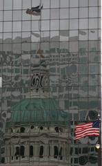 Reflection of the Old St. Louis County Courthouse exterior in building windows