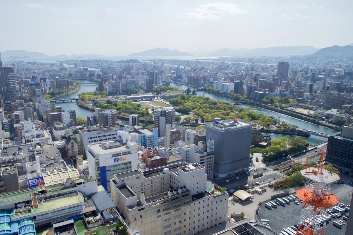 Overview of Hiroshima city with Hiroshima Castle in Japan viewed from a hotel rooftop