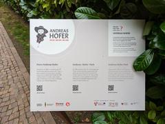 Scenic view of Andreas Hofer Park with greenery and pathways in Mantua