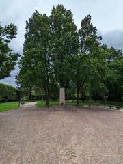 Andreas Hofer Park in Mantua with green trees and walking paths