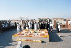 First Lady Jacqueline Kennedy observing a minute of silence at Gandhi's Raj Ghat in Delhi