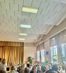 Speakers giving greetings at an event