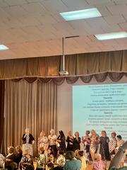 Theatrical composition How I Served the Lord scene with actors in rocky desert setting