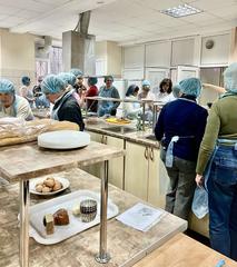 PUET team cooking traditional recipe dishes at the venue of the 2025 festival
