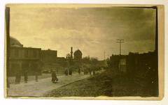 People walking down a road in Baghdad during World War I
