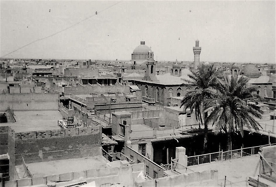 Historical view of houses, church, and mosque in the Shorjah neighborhood of Baghdad in 1942