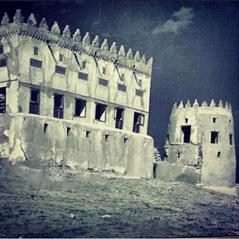 View of one of the watchtowers of Daryn Castle with a visible part of the palace before its collapse