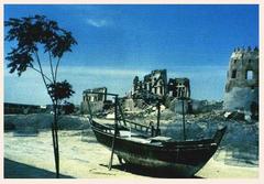 Ancient dhow boat sailing near Al-Fayhani Palace and Darin Castle in Al-Ahsa, Saudi Arabia